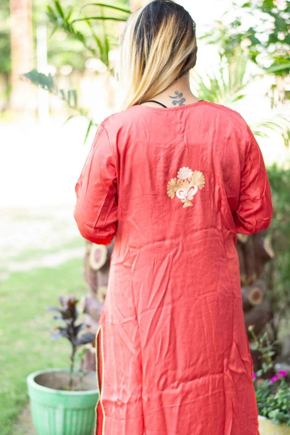 Carrot Colour Cotton Kurti With Beautiful Aari Embroidery Gives Attractive Look To The Wearer.