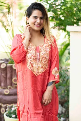 Carrot Colour Cotton Kurti With Beautiful Aari Embroidery Gives Attractive Look To The Wearer.